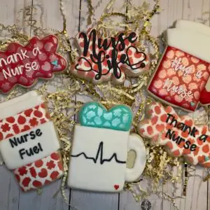Custom nurse appreciation cookie set with decorated royal icing cookies in red, white, teal, and heart-themed designs